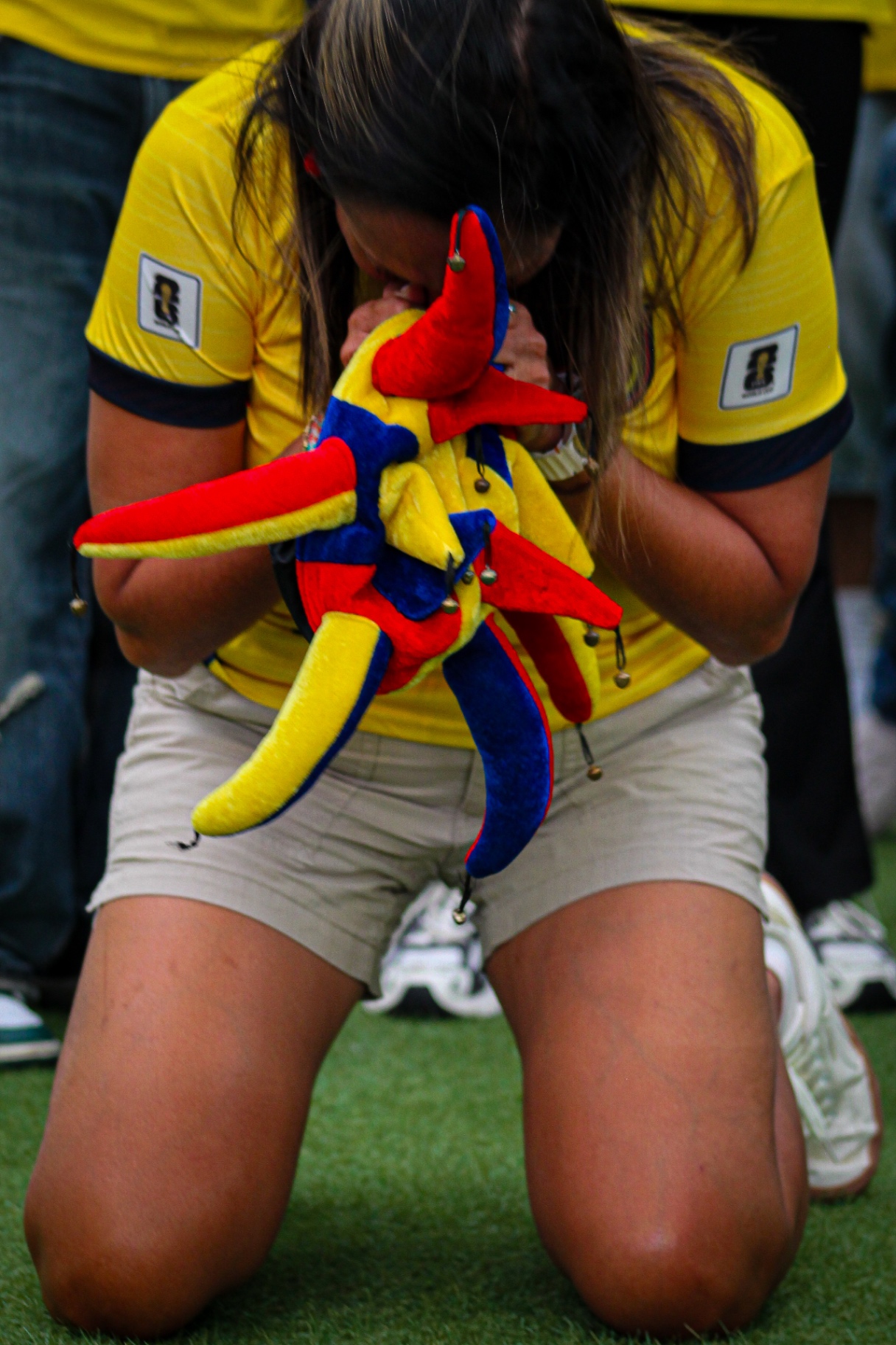 Fan kneeling in emotion
