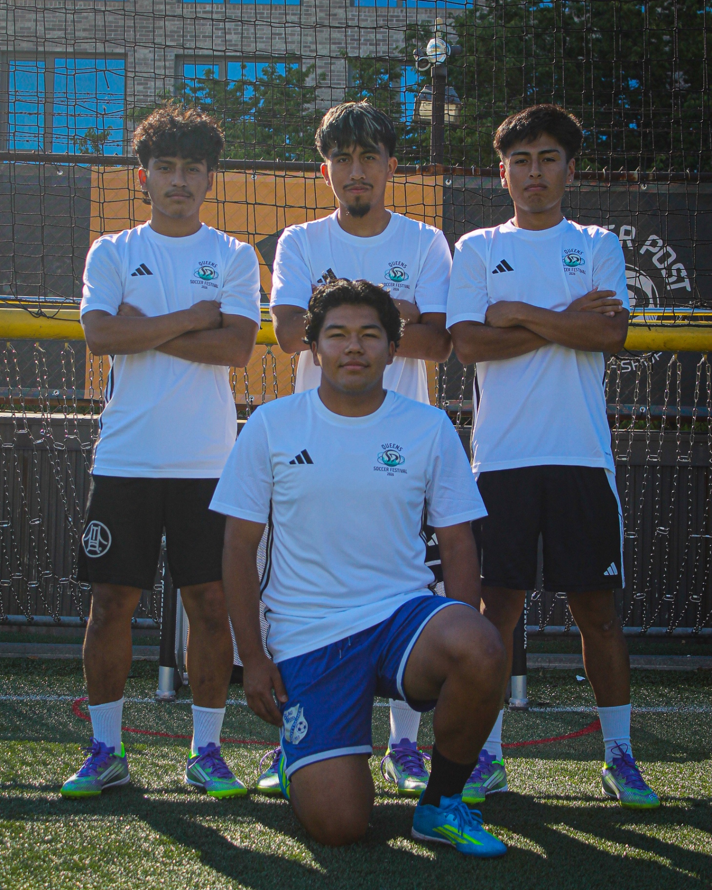 Team portrait at Queens Soccer Festival